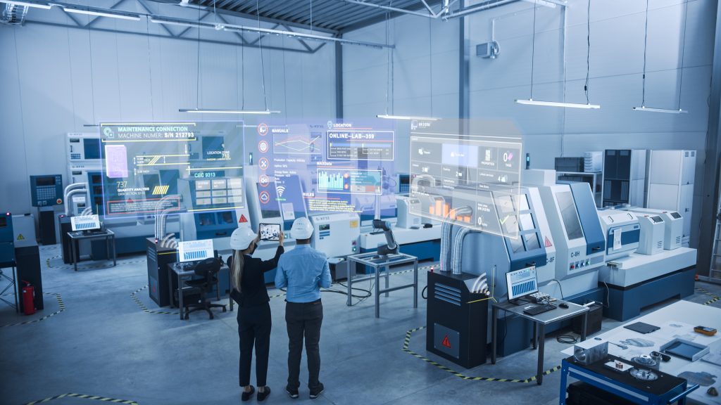 Manufacturing industry leaders building digital twins in a plant.