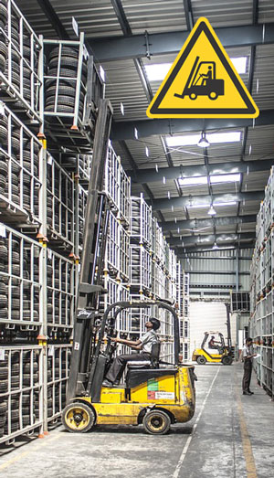 forklifts at an automotive warehouse