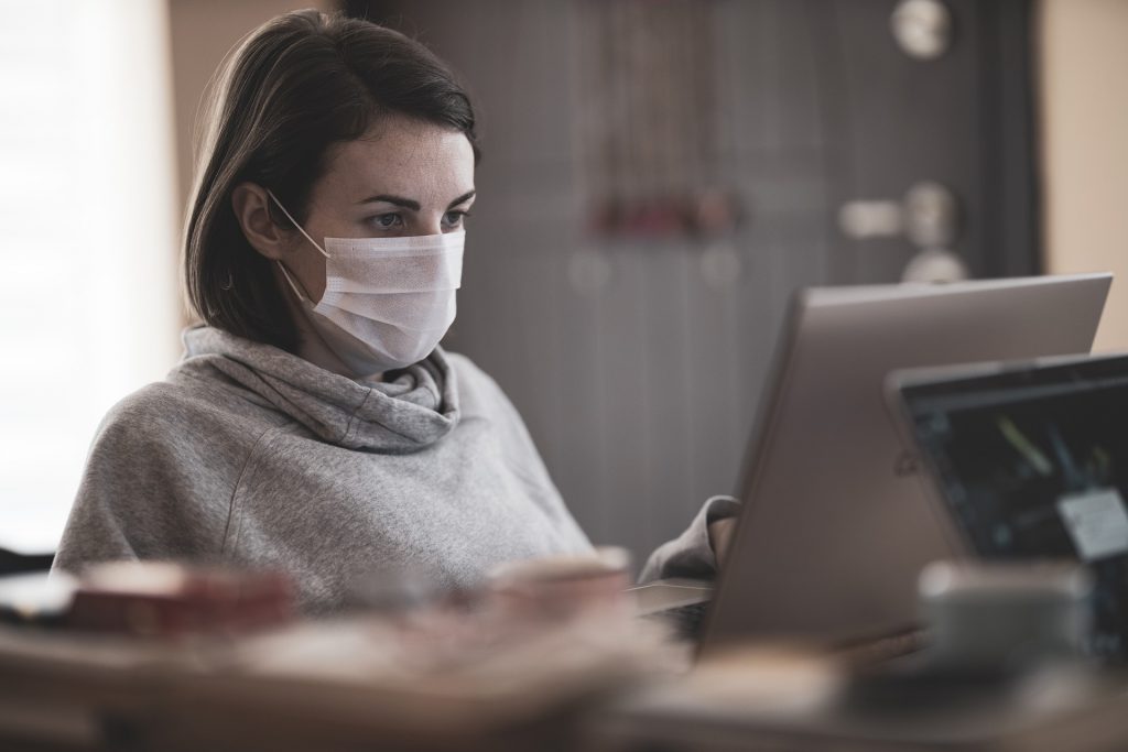 Employee wearing a face mask during pandemic.