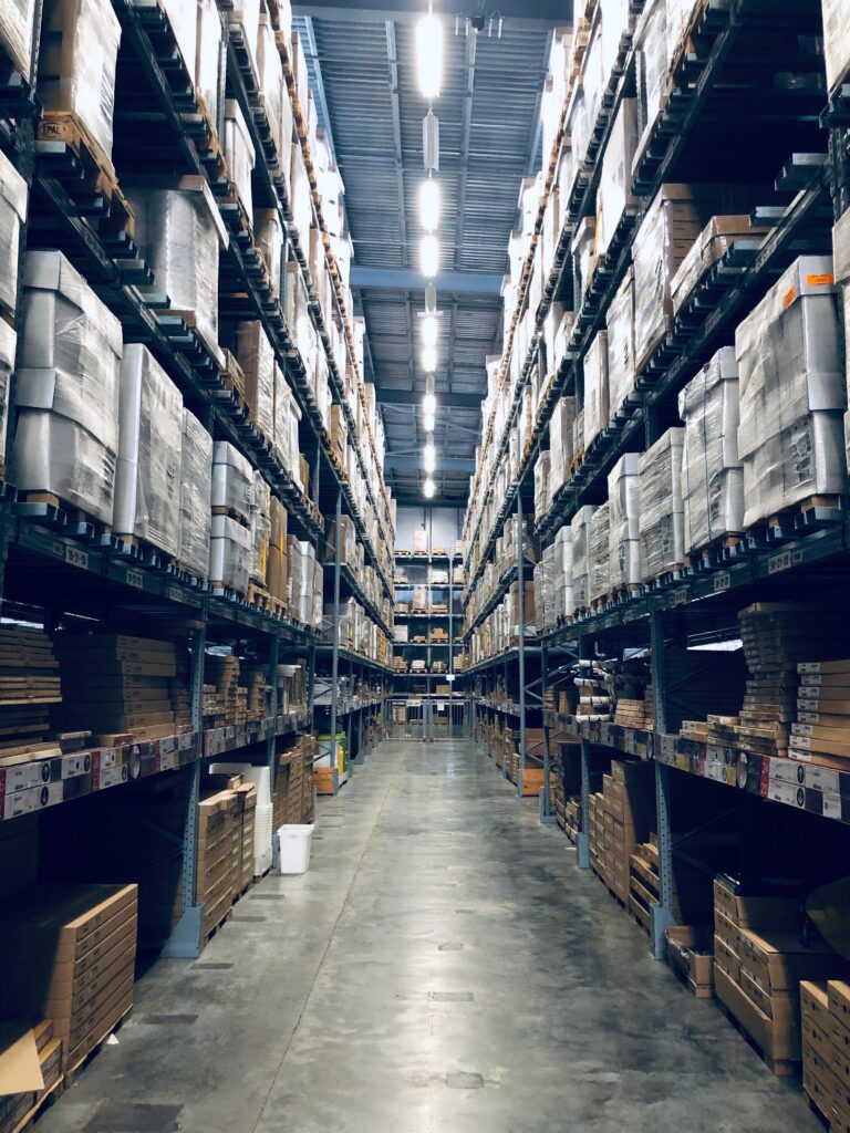 Stacked warehouse shelves - supply chain disruptions - Dassault Systemes 