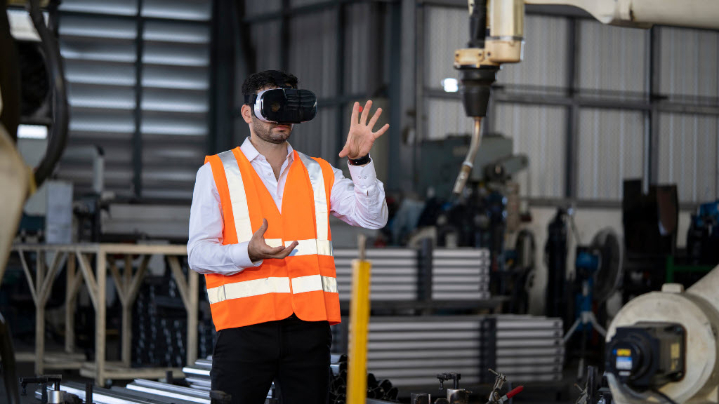 A manufacturing worker using virtual reality