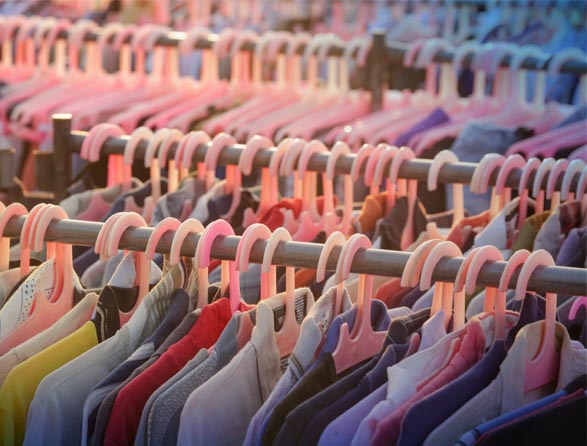 Clothes on hangers- Fast fashion environmental impact- Dassault Systemes 