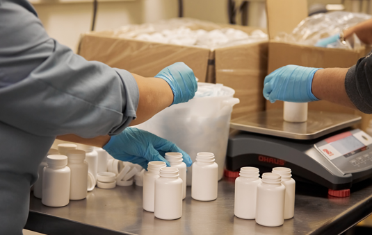 employees dealing with physical packaging prototypes